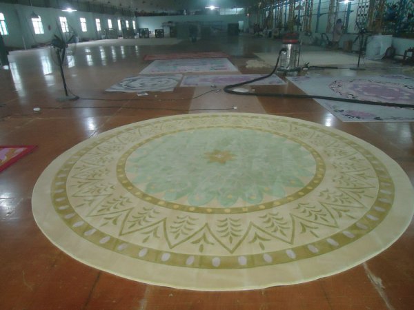 手工(gōng)地(dì)毯