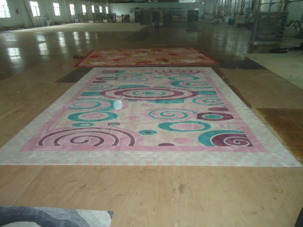 手工(gōng)地(dì)毯